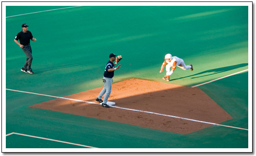[Travis Tucker diving for 3b]