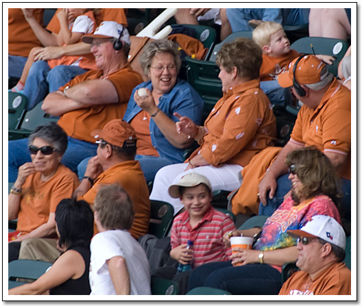 [Fan with a foul ball]