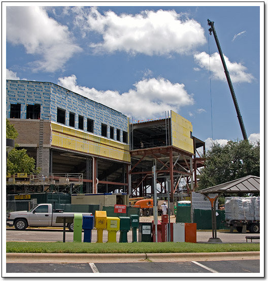 [behind home plate, from parking lot]