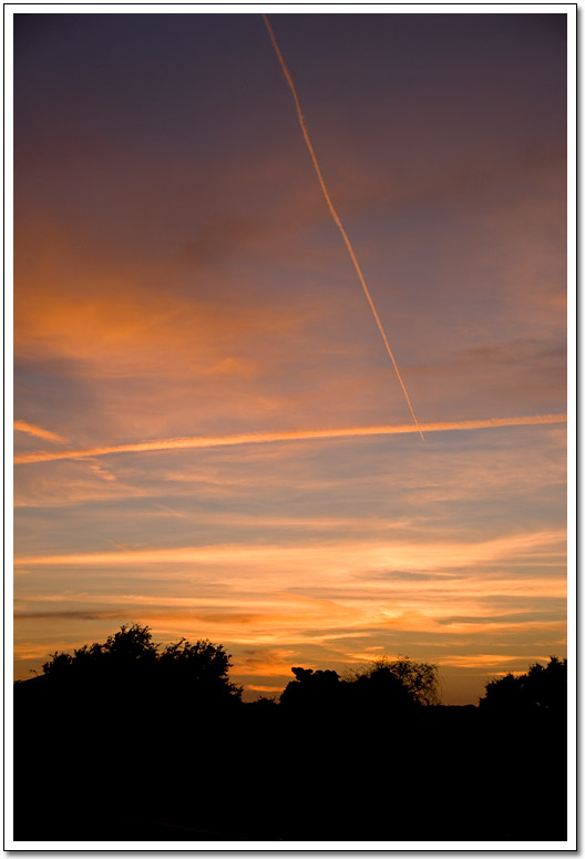 [Contrail sunset]