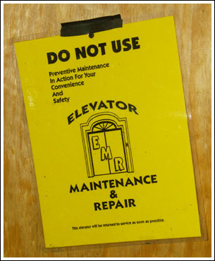 [Photo of elevator sign]