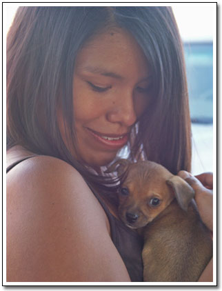 [Photo of Jennie and the dog]